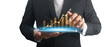 © denphumi - Businessman plan graph growth and increase of chart positive indicators ,tablet in hand