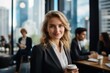 © aboutmomentsimages - Portrait of business woman executive director in skyscraper financial district
