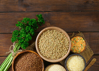 Poster - various types of cereals on a wooden table