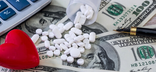 Wall Mural - drugs or medicine pills above hundred dollars bill