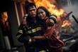 Scared young woman hugs brave fireman saved girl from fire on street. Professional firefighter in uniform carries upset lady survival in dangerous accident in city. Successful rescue operation