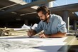 Architect Oversees Construction Plans On Rooftop, Showcasing Expertise