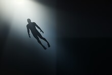 A haunting image capturing the silhouette of a man suspended in a dark, immersive space. Bathed in a beam of soft light, the figure appears to be floating effortlessly, invoking a sense of tranquility