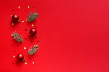 Wall Mural - red christmas background. top view photo of red christmas tree, red christmas balls, gold star ornam