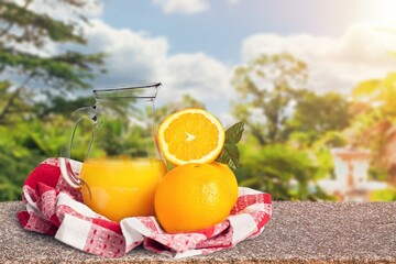 Wall Mural - Orange juice with ripe  fresh orange fruits