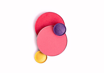 Pink Blusher and Face Powder. Shimmering bright palette of Face Cosmetics Make up. Craked texture of round blusher against white background with copy space for text.