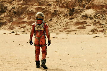 Wall Mural - courageous astronaut in the space suit explores red planet mars covered in mist. adventure. space tr