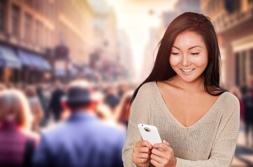 Poster - Cheerful young woman holding smart phone.