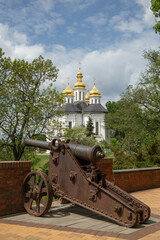 St. Catherine's Cathedral and old cannons on the former citadel in the park of chernihiv 