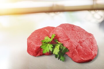 Raw fresh red beef steak with herb