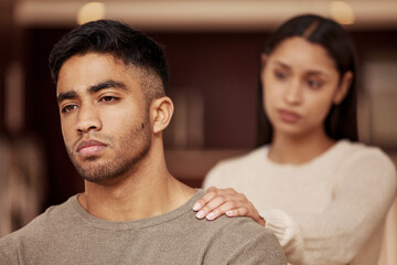 Wall Mural - Divorce, fight and couple in a house with stress, worry or fear of infertility crisis in their home together. Marriage, conflict and sad man reject toxic woman in living room with argument or dispute