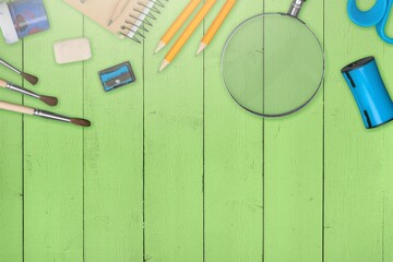 Sticker - Back to school. Frame of school supplies on background.