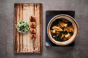 Wall Mural - japanese lunch on the dark background