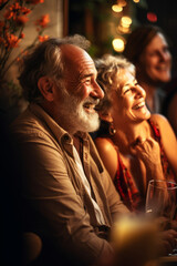 Wall Mural - Elder adults having laugh and drink at a party vertical view