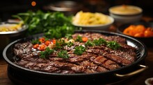 Grilled beef steak on black grill pan with vegetables, closeup