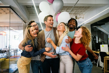 Wall Mural - Group of happy people celebrating birthday among friends, smiling while having a party