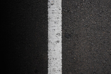 Canvas Print - Close-up view of the black asphalt