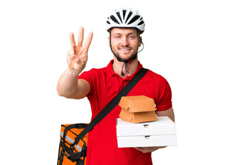 Wall Mural - Young delivery man taking a takeaway food over isolated chroma key background happy and counting three with fingers