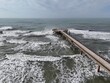 Marina di Pietrasanta, Tuscany: aerial view the beach and the pier in a windy day of autumn.