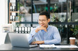 © laddawan - Mature business man executive manager looking at laptop watching online webinar training or having virtual meeting video conference