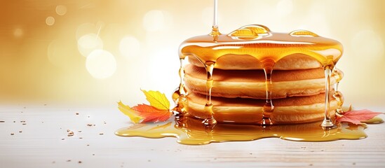 Wall Mural - Fresh pancakes with maple syrup and honey texture copy space image