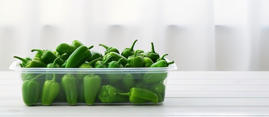 Poster - Harvested vegetables in a plastic box on a white wooden table copy space image