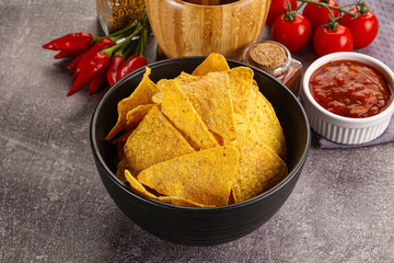 Wall Mural - Mexican corn nachos chips with salsa