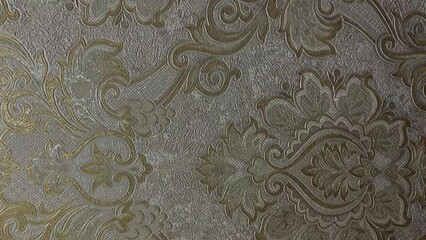 golden embossed wallpaper with patterns