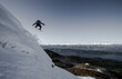 © ADDICTIVE STOCK - Anonymous man jumping with snowboard on Swiss Alps