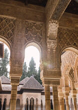 From Below Of Moorish Arches In The Court Of The Lions At Alhambra, In Granada, Spain
