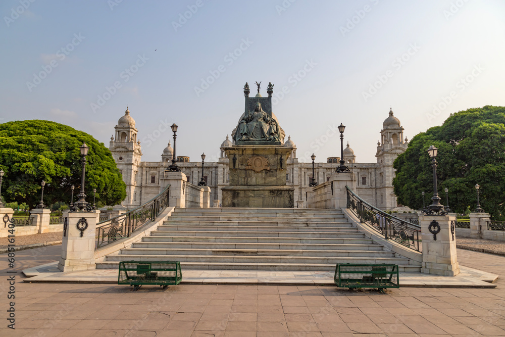 View of The famous Victoria Memorial with Garden, a large marble building in Central Kolkata, at the time of Sunrise.