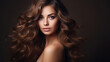 © NooPaew - photography of Beauty brunette girl with long shiny curly hair . Beautiful smiling woman model wavy hairstyle . Cosmetology, cosmetics and make-up.