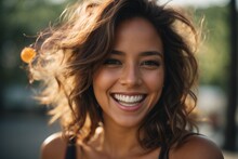 Portrait of a young woman smiling with happiness and looking at the camera. Closeup of a girl with a perfect gummy smile.