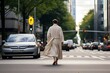 man in a bathrobe crossing the street