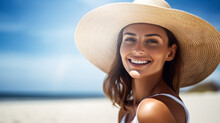 Tanned Young Woman Smiling On The Beach Wearing Sunhat