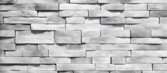 Poster - Minimalist grayscale stone brick wall with seamless abstract design creating a beautiful textured backdrop with ample workspace copy space image