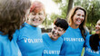 © Vane Nunes - Diverse group of volunteer people celebrating together outdoors. Women teamwork and charity support concept.