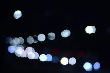 Blurred view of night city street