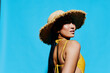© SHOTPRIME STUDIO - Woman fashion smile summer beauty expression portrait yellow trendy swimsuit hat