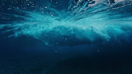 Fototapete - Underwater view of the ocean wave breaking over the reef