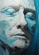 painting of a woman's face with eyes closed covered in blue liquid