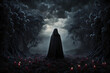 A man or woman in darkness with his back turned and wearing a hood