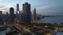Aerial View Over The Polk Bros Park, Toward Traffic In Front Of Streeterville, Fall Dusk In Chicago