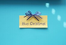 Note On Blue Background With Handwritten Text Blue Christmas -  Means Sadness In Festive Time, Away From Family- Feelings Of Loneliness, Family Tensions,, Social Anxieties Or Peer Expectations