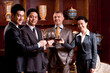 © Blue Jean Images - Businessmen toast for celebration