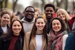 © robertuzhbt89 - Group of diverse smiling people standing outdoors.
