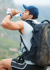 Poster - Man, hiking and drinking water in nature rest for fitness, exercise and workout in Brazil mountains. Hiker, athlete and person with liquid bottle for summer sports break, electrolytes and wellness