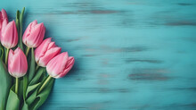 Tulip Border With Copy Space. Beautiful Frame Composition Of Spring Flowers. Bouquet Of Pink Tulips Flowers On Turquoise Blue Vintage Wooden Background. Generative AI.