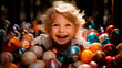 Una escena encantadora y alegre en la que un niño sostiene en sus brazos un montón de huevos de Pascua de vivos colores.