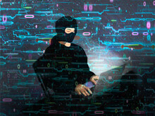 Illustration of masked hacker using laptop